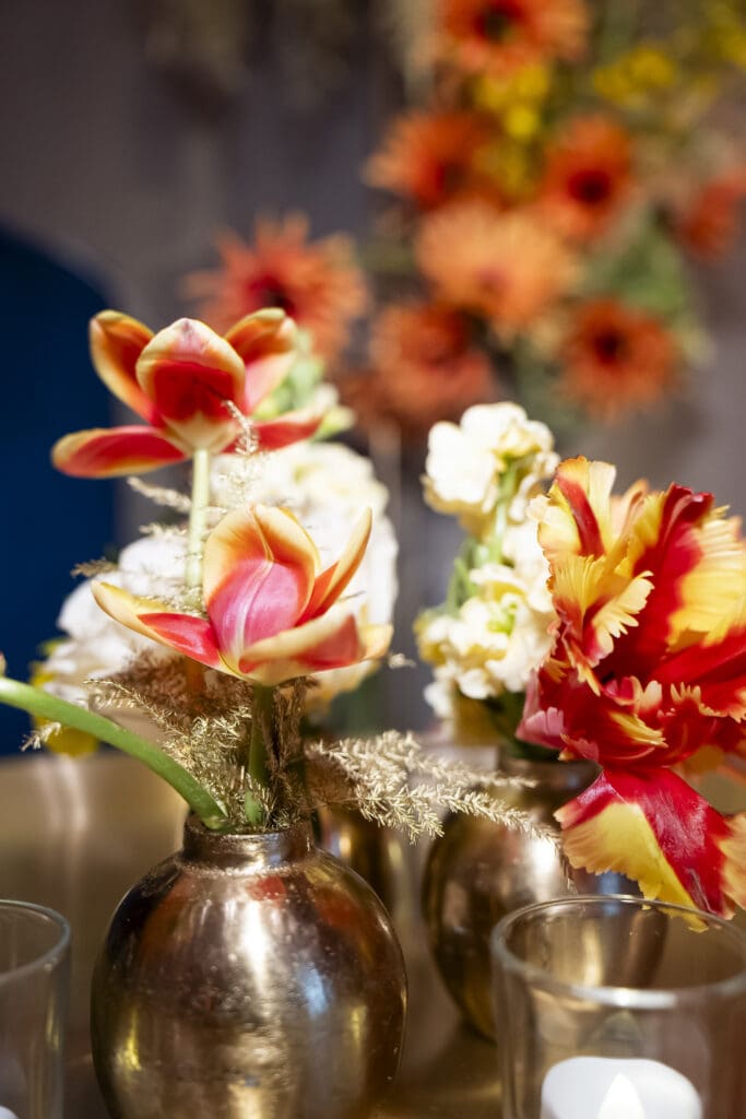 Bold and beautiful bud vases for a corporate dinner event.